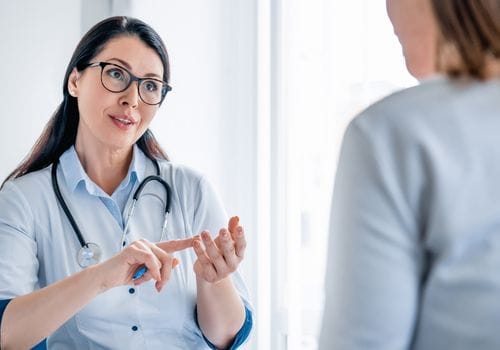 GP consulting with a patient during a family medicine appointment in Surfers Paradise
