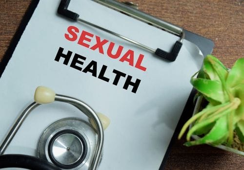 Sexual health clinic notes and a stethoscope representing confidential sexual health care in Surfers Paradise