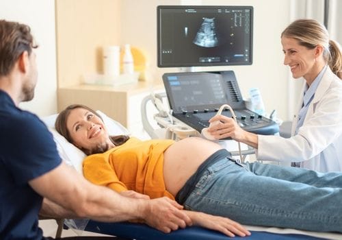 Sonographer performing a pregnancy ultrasound during antenatal care in Surfers Paradise